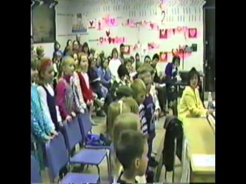 Young Sayre Elementary Students & Mr. Whitmore Singing For The South Lyon School Board (Winter 1995)