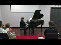Christine Martin Playing Alouette On Her Piano For The Audience