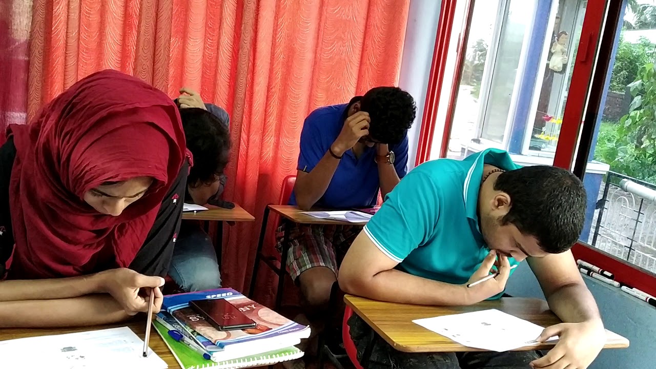 Goethe German A2 students solving Hören question paper