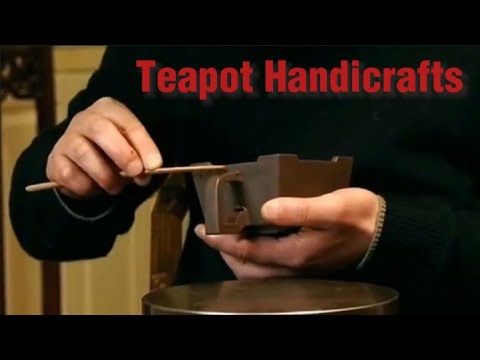 The Enchanting World of Yixing Teapot Artistry: Unveiling the Craftsmanship and Handwork