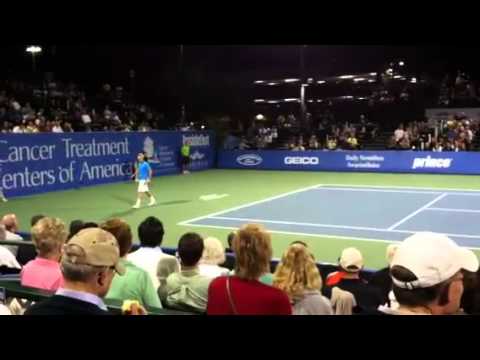 John McEnroe rallies with Michael Chang