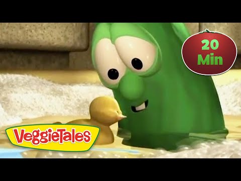 Green VeggieTales character leaning toward a small yellow duckling in a watery scene, logo visible on the bottom left.