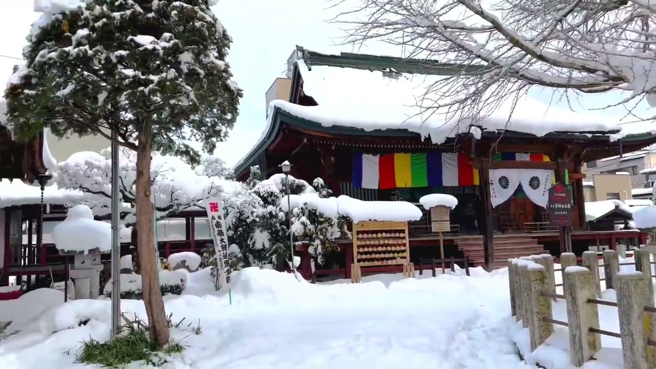 The Hida Kokubunji Temple, majestically draped in a blanket of snow.