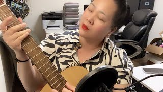 how to strum a guitar