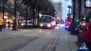 Alabama's team buses riding to the stadium for the BCSNC