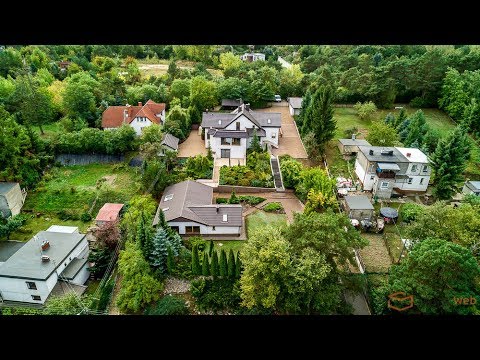 Rezydencja z basenem w Puszczykowie w środku Wielkopolskiego Parku Narodowego