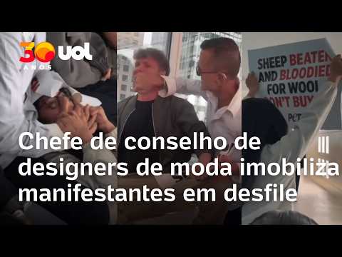 Chefe de conselho de designers de moda imobiliza manifestantes da PETA durante desfile em Nova York