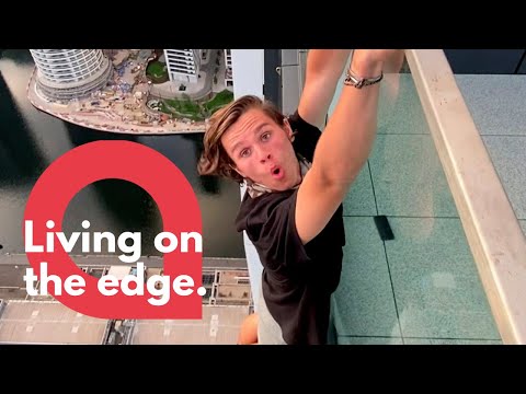 Daredevil hangs from ledge of London skyscraper | SWNS