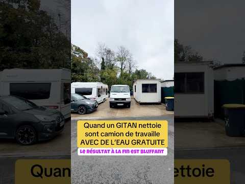 Un gitan nettoie son camion avec de l’eau gratuite