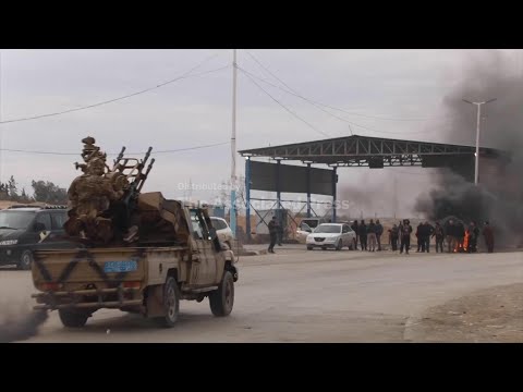 Syrian government forces enter northern towns after Kurdish fighters withdraw