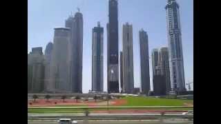 preview picture of video '88 tallest buildings in Dubai  (United Arab Emirates) Sightseeing by Metro train !'