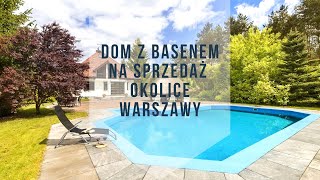 A house near Warsaw Poland for sale - a villa with a swimming pool, next to a forest and a lake.