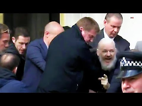 Julian Assange carried out of Equador embassy by police