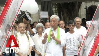 Elderly citizens in Hong Kong gather for silent march