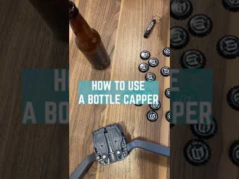 Part of a video titled How To Use a Bottle Capper for Homebrewing #shorts - YouTube