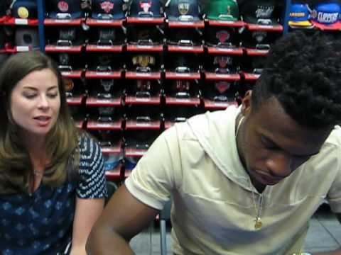 Buddy Hield signs autographs for The SI KING 6-21-16