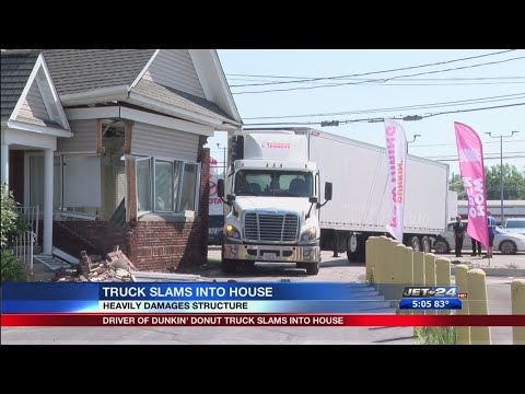 Dunkin' Donuts delivery truck slams into home near new...