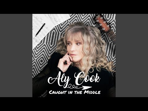 download lagu mp3 mp4 Aly Cook Caught In The Middle, download lagu Aly Cook Caught In The Middle gratis, unduh video klip Download Aly Cook Caught In The Middle Mp3 dan Mp4 Music Gratis