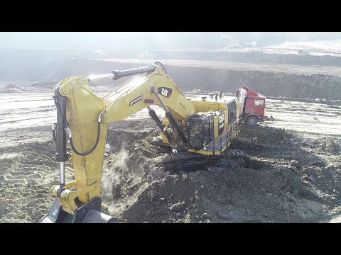 Aerial View Of Caterpillar 6015B Excavator Loading Trucks With Two Passes - Sotiriadis Mining Works