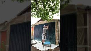 Album cover: Spraying garage doors