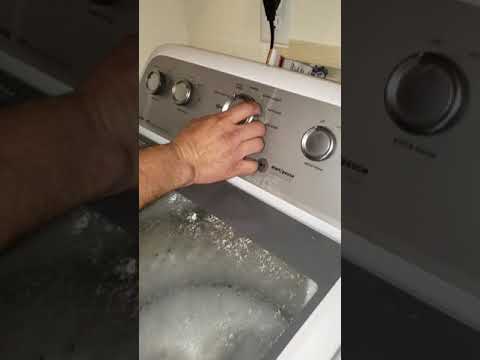 Repair man shows how to recalibrate Maytag Bravo