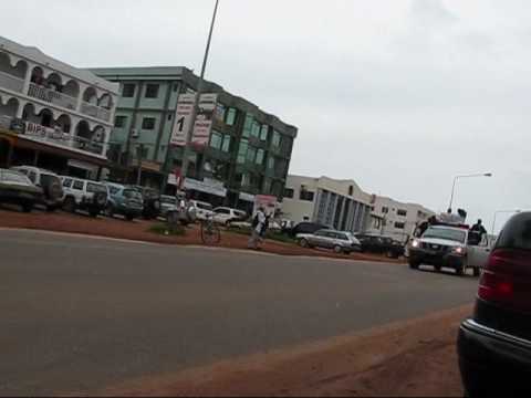 President Jammeh's Motorcade Drives by the America