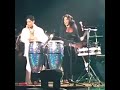 Sheila E and Prince playing drums together.
