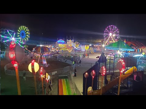 Life on the Road: Setting Up Rides at a Carnival