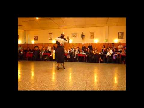 Coca Cartery  and  Osvaldo Cartery  are  dancing  to  the  tango  "  Carrillon De La Merced  "