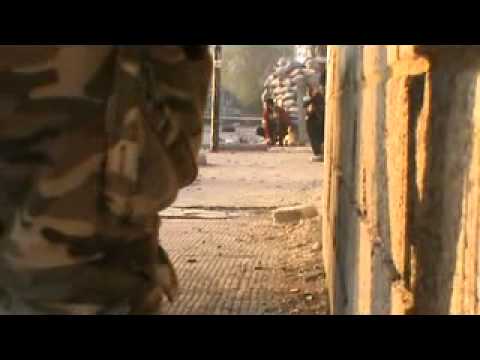 اشتباكات بين مقاتلي كتيبة صقور الجولان وقوات النظام في شارع الثلاثين في مخيم اليرموك في مدينة دمشق