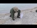 Thousands Of Glass Shards Found Along Lake Michigan Beach