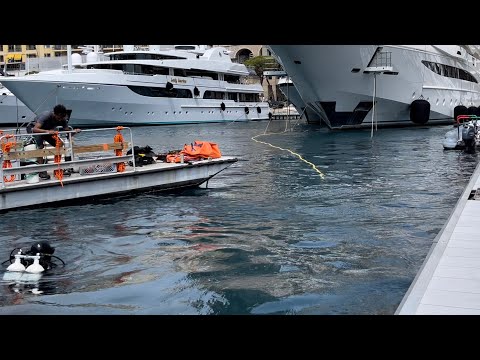 DIVER SECURING MOORING LINE (BOW LINE) OF MIMTEE YACHT IN PORT OF MONACO @archiesvlogmc