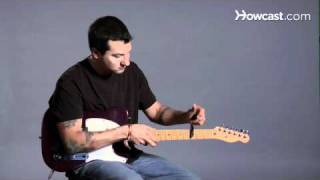 Video thumbnail for How to Use a Capo | Guitar Lessons by Howcast