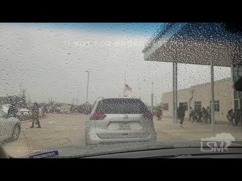 03-30-2023 Fort Worth, TX  - Rain starts as children are let out of school