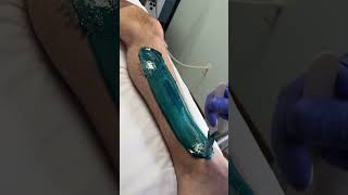 Professional lower leg wax using blue hard wax formula from Starpil. #esthetician #waxing