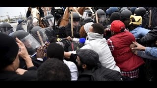 Baltimore Riots Freddy Gray Protesters damage cars; 12 arrested
