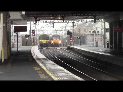 Irish Rail 8100 EMU 8108 + 8112 departs and 22000 DMU 22044 passes Clongriffin