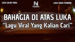 Download lagu LAGU GALAU VIRAL TERBARU | 'BAHAGIA DI ATAS LUKA' (LIRIK VIDEO 2026) mp3