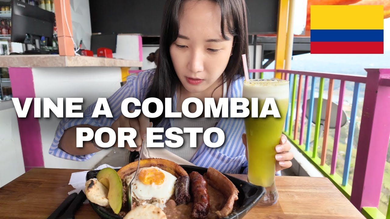 Coreana prueba bandeja paisa y visita El Peñón de Guatapé