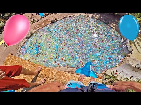 10,000 WATER BALLOONS FILL POOL! Video