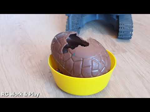RC Volvo EC160E 3-in-1 excavator demolishing an m&m's Easter egg!
