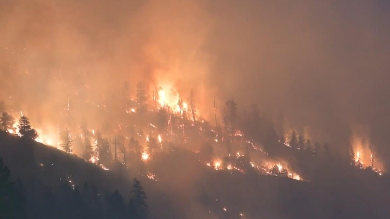 Wildfires in Colorado rapidly spread, destroying buildings and forcing evacuations