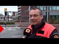 Geschrokken buren zien stenen van gevel stadskantoor Tilburg vallen, 'Het was een enorme klap'.