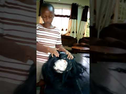 Wig making by Charles kavehere