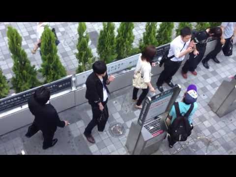 Smoker's corner near south exit of Shinjuku Station in Tokyo
