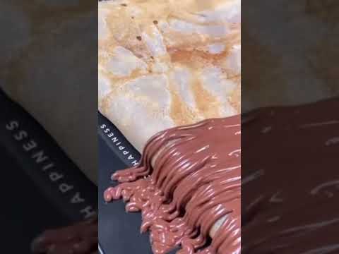 🤤 What is the PERFECT amount of Nutella Chocolate Drizzle on a Crepe #shorts #crepe #nutella