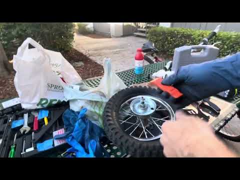 Razor mx 350 electric dirt bike rear wheel tire removal.