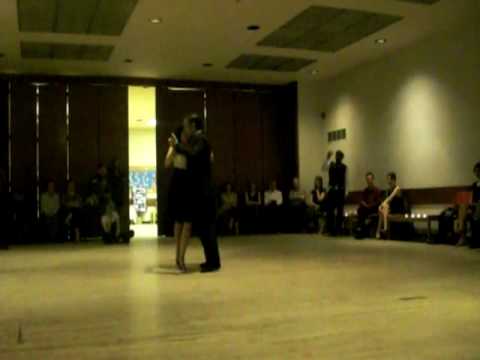  Alejandro Hermida  and  Nayla Vacca  are  dancing  to  the  milonga  "  Cuando Un Viejo Se Enamora  "