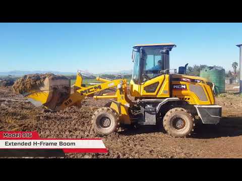Loading Feed Mixer with South Africa's MCM 918 Front End Loader