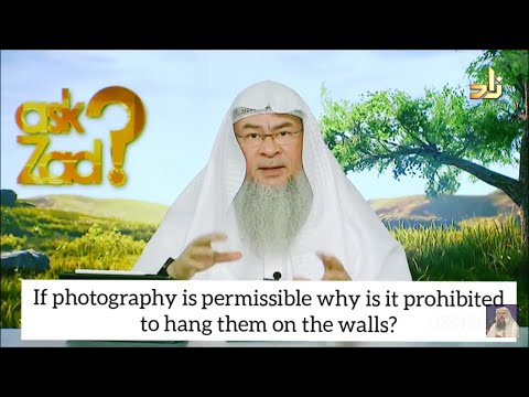 If photography is permissible, why is it prohibited to hang pictures on the walls? - Assim al hakeem